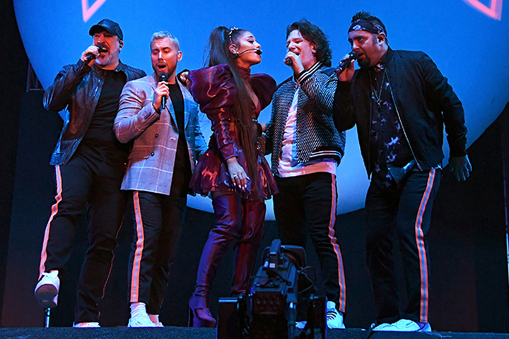 Ariana Grande (C) performs onstage with members of NSync (L-R) Joey Fatone, Lance Bass, JC Chasez, and Chris Kirkpatrick during the 2019 Coachella Valley Music And Arts Festival on April 14, 2019 in Indio, Calif.