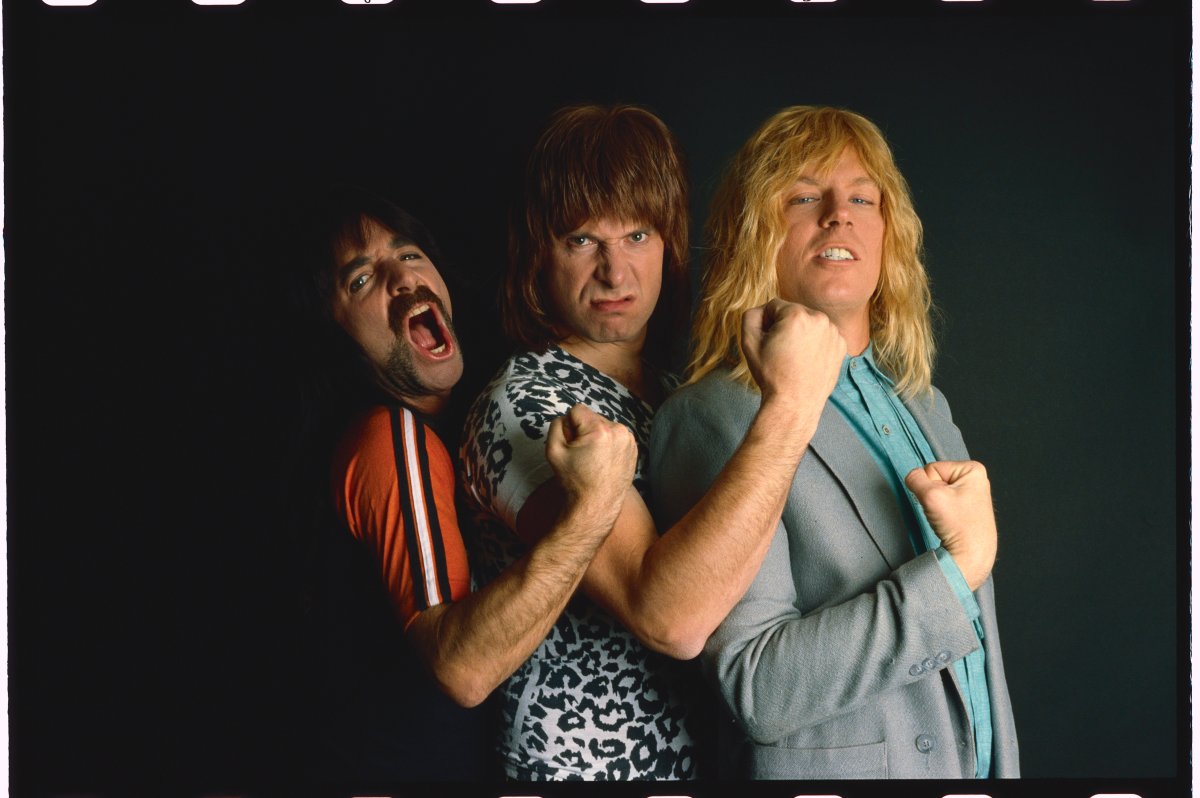 Satirical metal band Spinal Tap: Derek Smalls, Nigel Tufnel (centre), David Saint Hubbins, Tufnel's custom amp came with a volume control that 'goes to 11' instead of the usual 10.