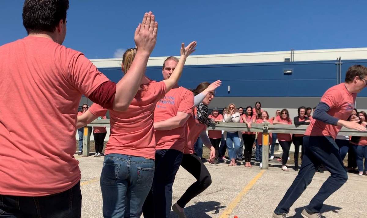 Staff at the Johnston Group set a new record on National High-Five Day.