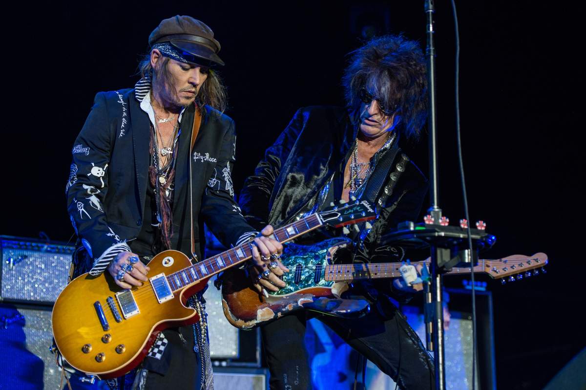 Johnny Depp (L) and Joe Perry of Hollywood Vampires perform live on stage at Wembley Arena on June 20, 2018, in London, England.