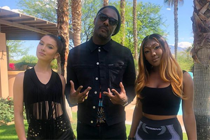 Idris Elba (C) and daughter Isan Elba (R) at the 2019 Coachella festival in Indio, Calif. on April 12, 2019.