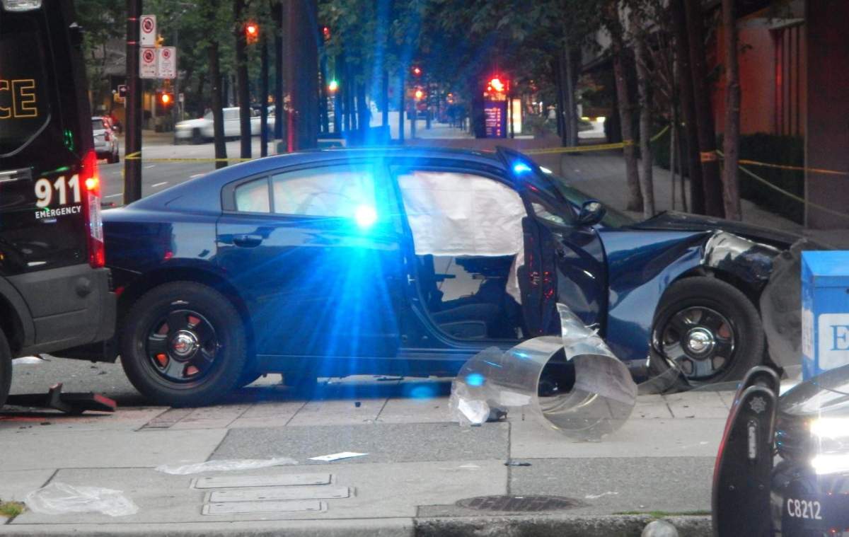 The scene of a collision between two VPD vehicles near the Vancouver Law Courts on June 30, 2018. The Independent Investigations Office is recommending charges against the officers involved, as well as the officer involved in another crash that same summer.