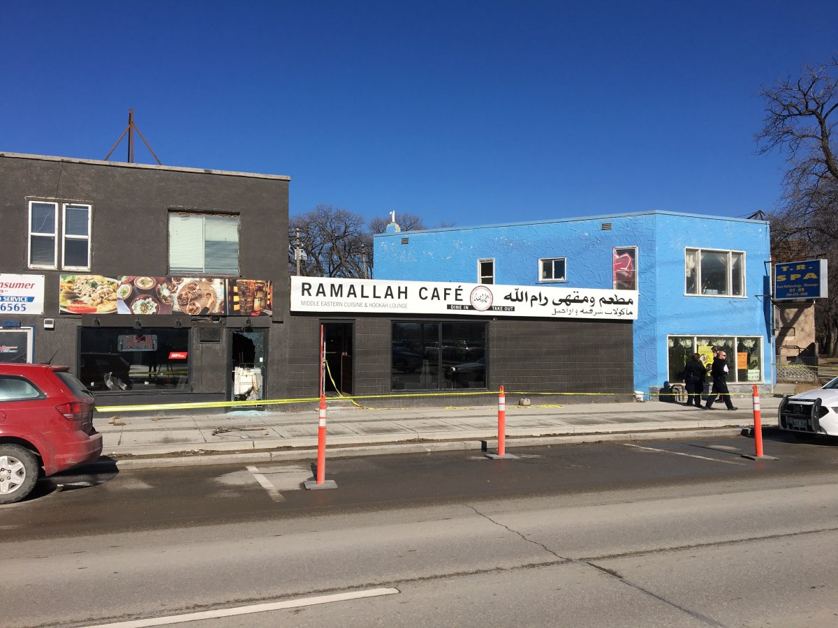 Police at the scene of the Ramallah Cafe on Pembina Highway on April 16, 2019.