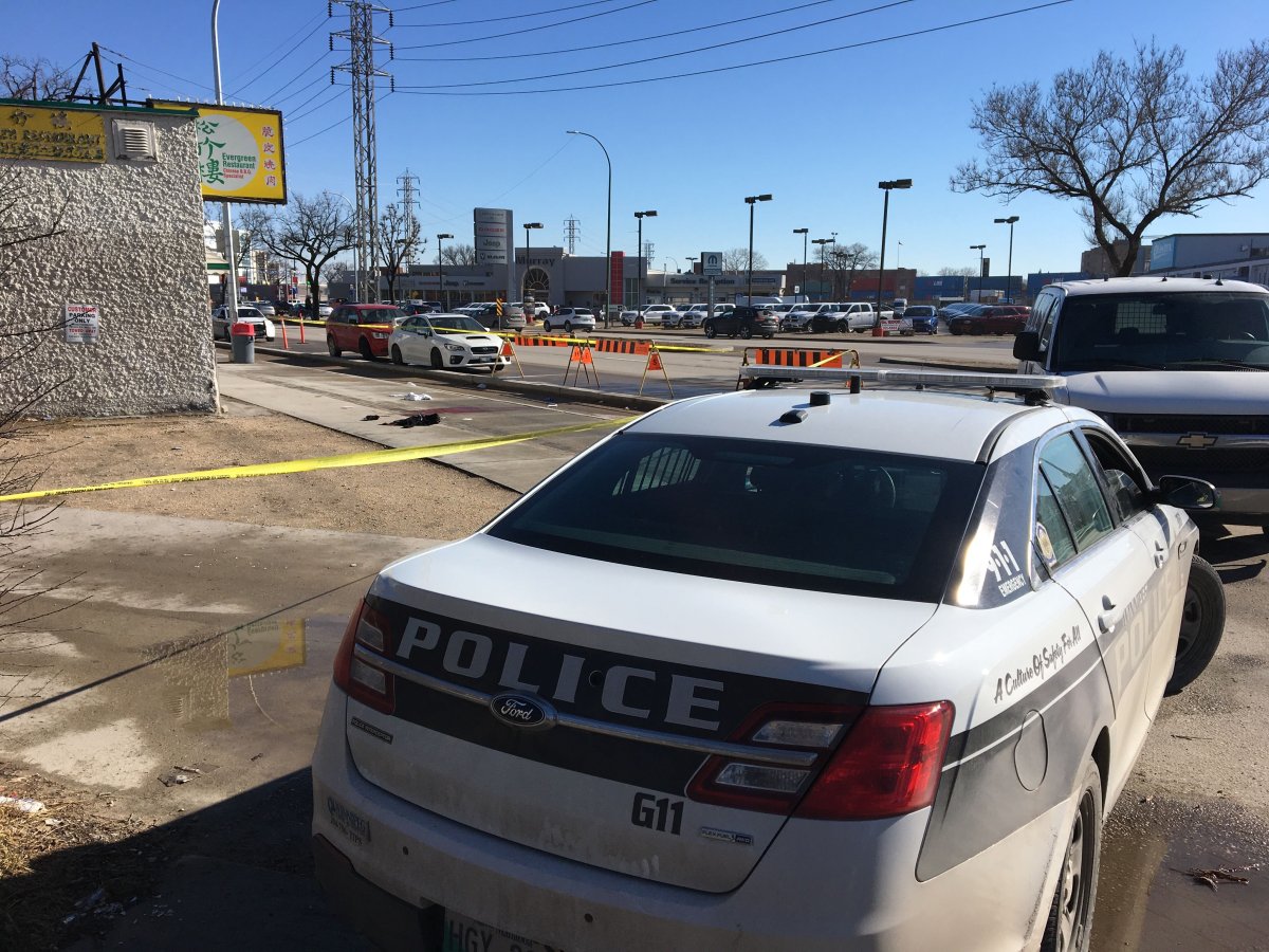 Police at the scene of a homicide at the Ramallah Cafe on Pembina Highway on April 16, 2019.