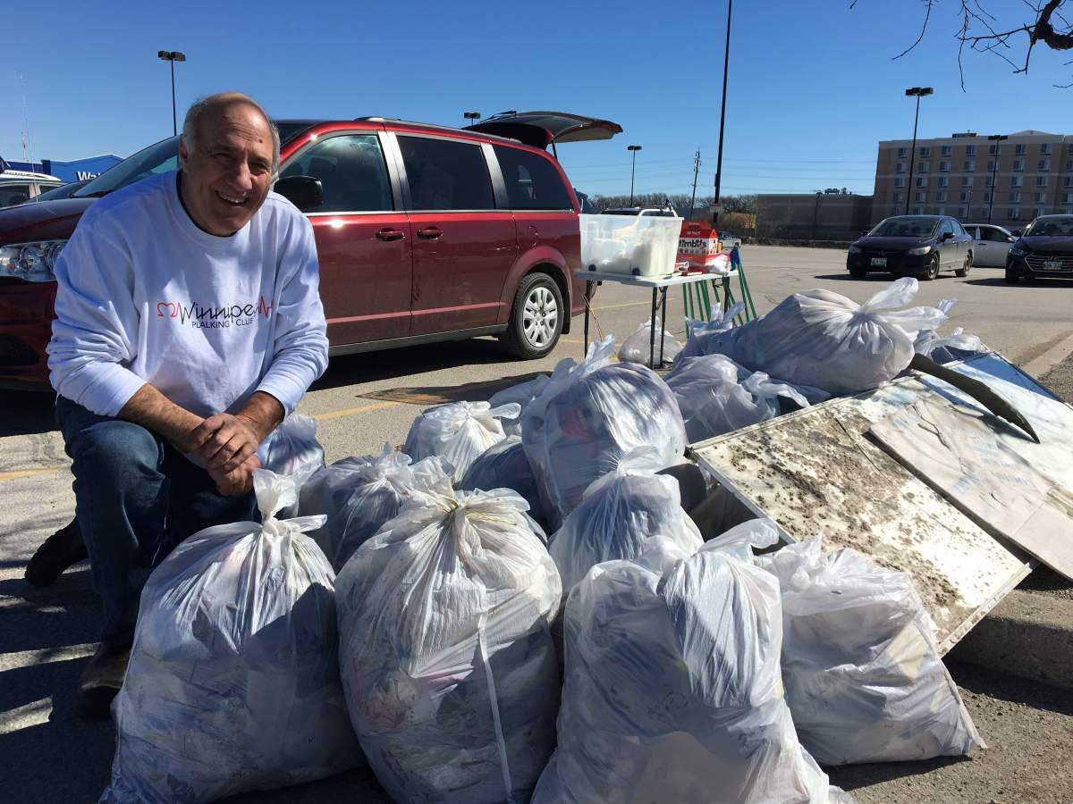 Tom Ethans with a portion of the garbage collected at the Plalking Club's first clean-up event of the season.
