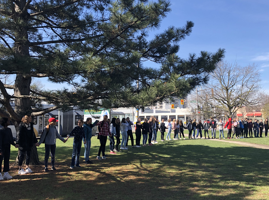 Students at Westdale Secondary School formed a 'ring of peace' by holding hands around the perimeter of the school on Thursday afternoon.