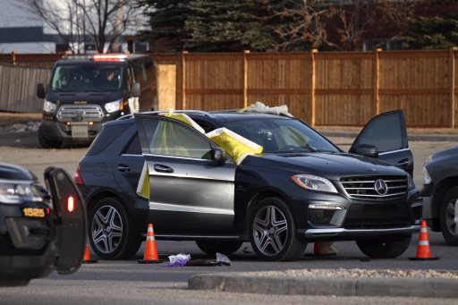 Calgary police investigate a deadly shooting in the parking lot outside Mazaj Lounge and Restaurant on Wednesday, April 3, 2019.