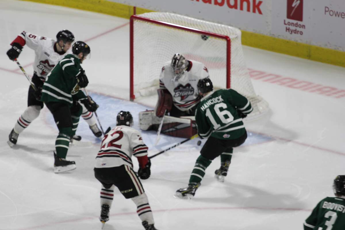 London, Ont - Anthony Popovich of the Guelph Storm makes a stop in close in a 3-1 Guelph Storm win over the London Knights in Game 5 of their best-of-7 second round series on April 12, 2019.