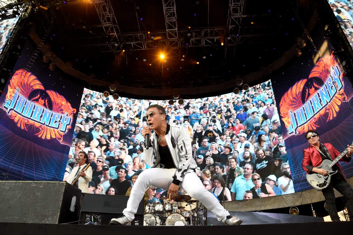 Arnel Pineda and Neal Schon of Journey performs onstage during The Classic West at Dodger Stadium on July 16, 2017 in Los Angeles, Calif.