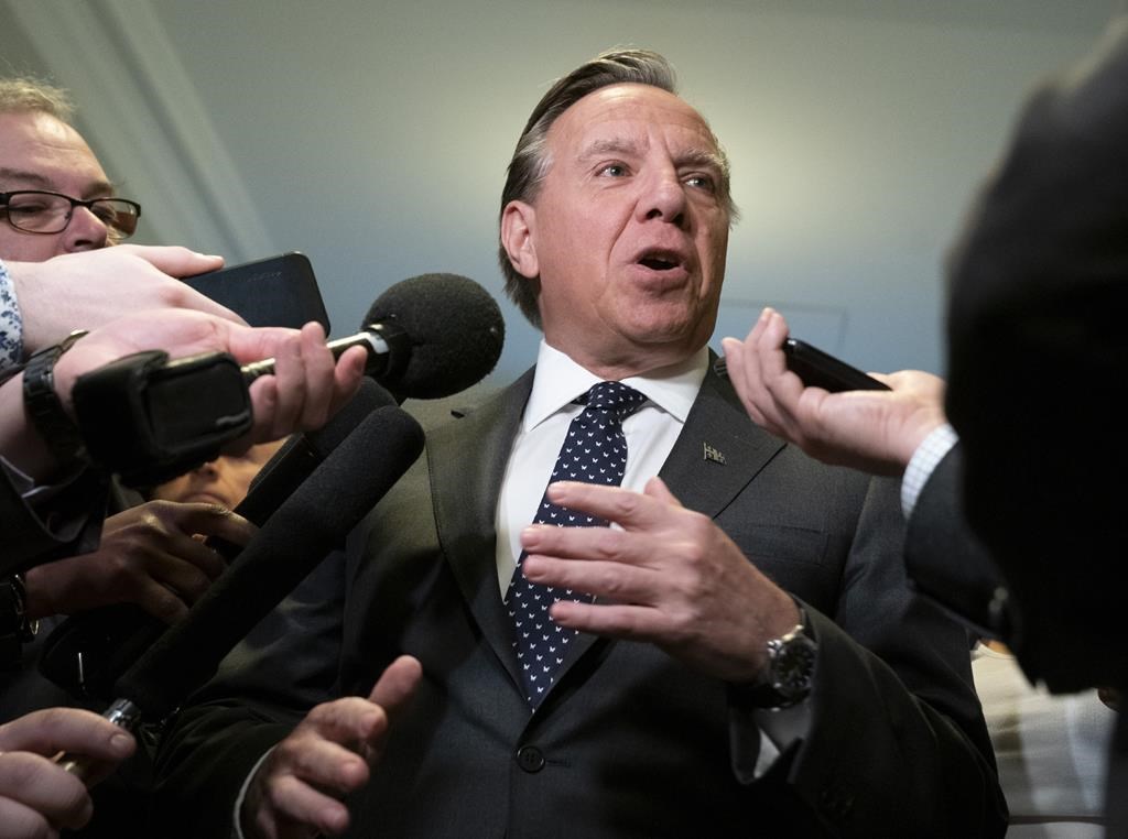Quebec Premier Francois Legault speaks to reporters Thursday, March 28, 2019, at the legislature in Quebec City.