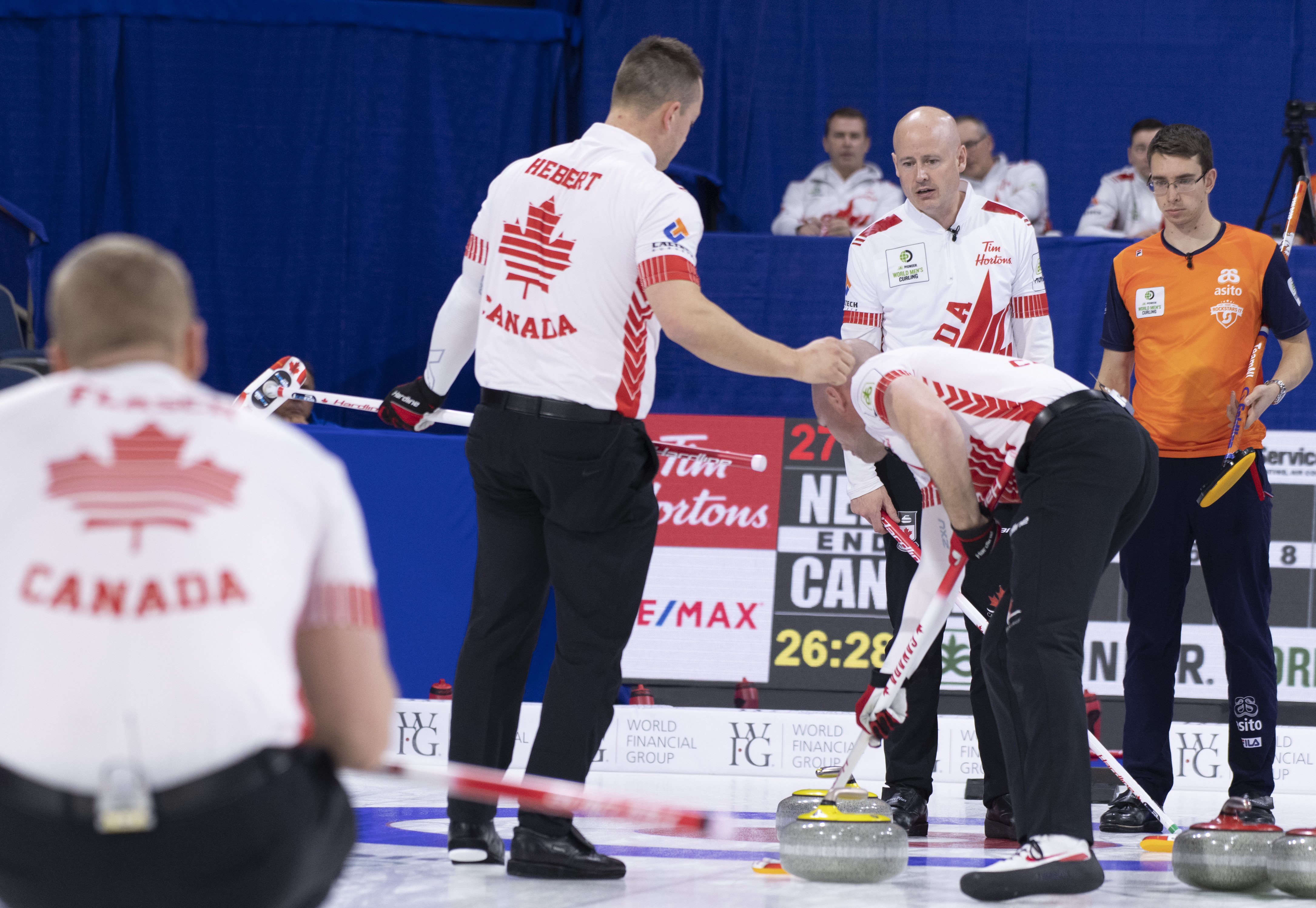 Canadas Kevin Koe secures playoff spot at world mens curling championship Globalnews.ca