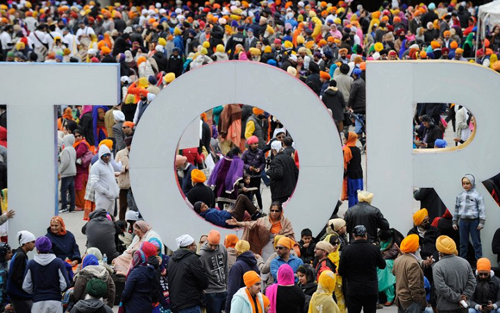 Thousands of Sikhs gather at Nathan Philips Square in 2017 for Khalsa Day celebrations.
