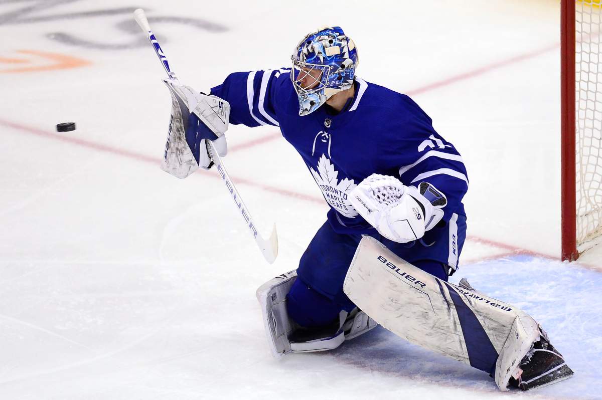 Toronto Maple Leafs goaltender Frederik Andersen (31) makes a blocker save during first period NHL playoff hockey action against the Boston Bruins in Toronto on Sunday, April 21, 2019.
