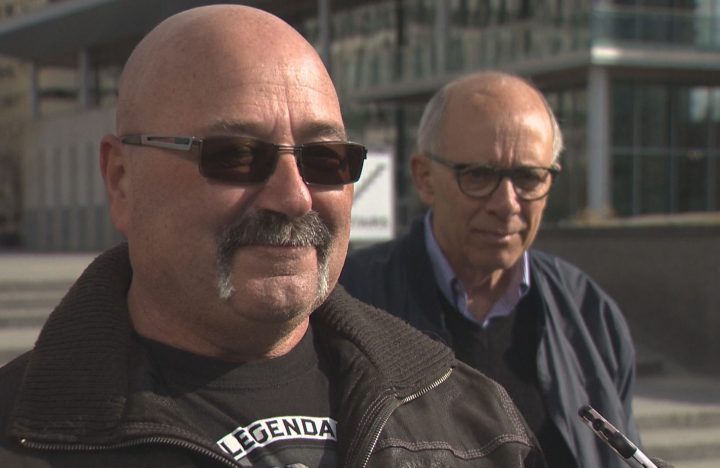 Bob Wispinski and Alberta Party Leader Stephen Mandel speak to media in Edmonton on Sunday.