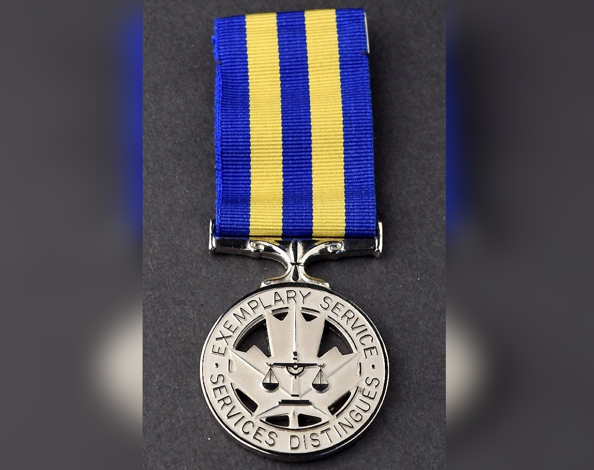 Guelph police say a police medal was among the items stolen during a series of break-ins over the weekend.