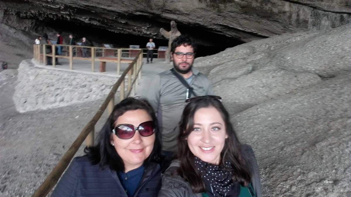 Tamara Orellana Azolas posing for a family selfie.
