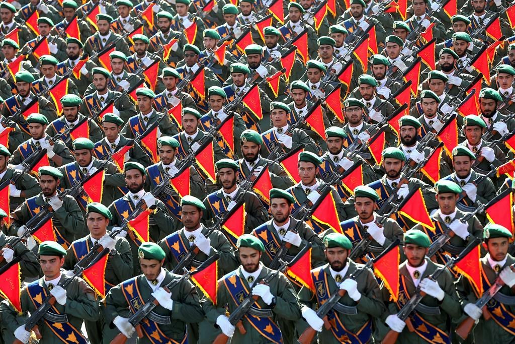 Iran's Revolutionary Guard troops march in a military parade.