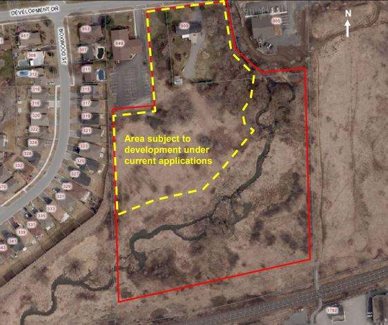 Local developer plans to build housing on a portion of 809 Development Drive, but remains frustrated over parkland talks with the city.