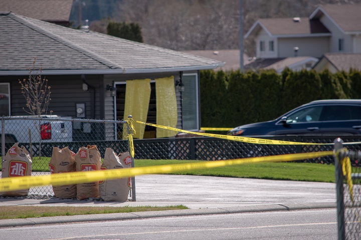 Police tape is seen outside of a home after a shooting spree in Penticton, B.C., on Monday, April 15, 2019. Two men and two women were killed in what one police officer called a "very dark day" for the city.