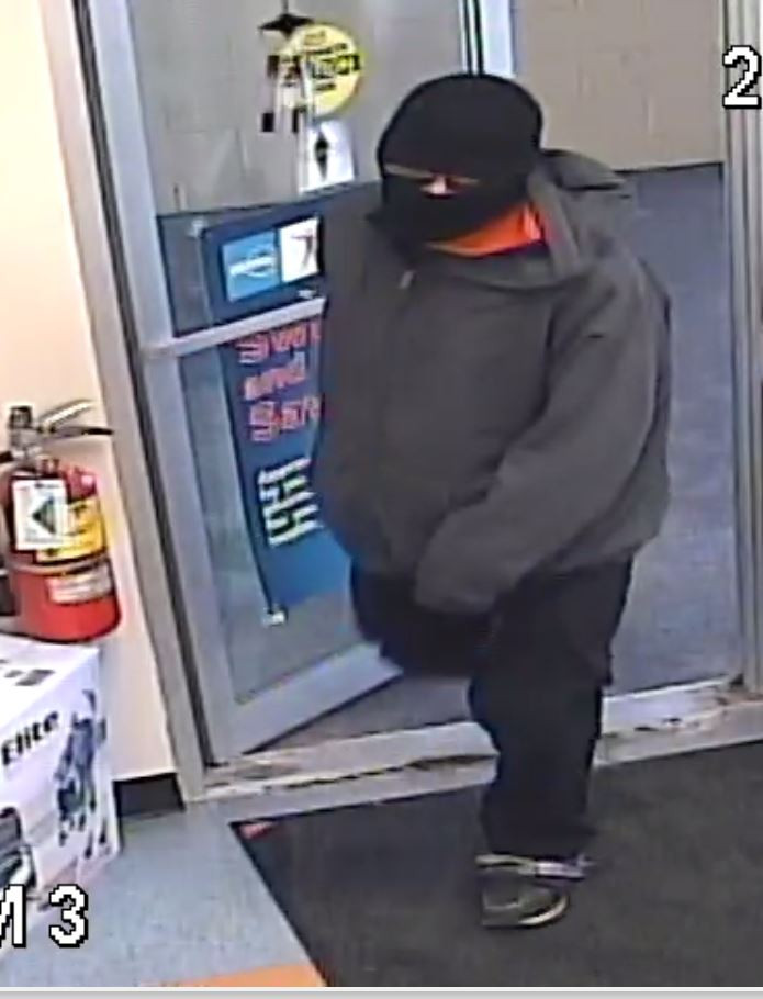Police in Moncton are searching for this suspect in a reported armed robbery at a pharmacy. 
