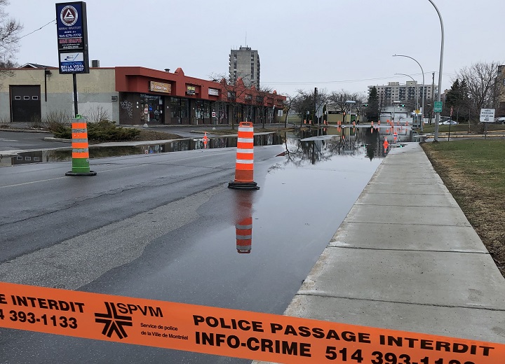 Montreal police have cordoned off a street in Pierrefonds due to flooding. Sunday, April 21, 2019.