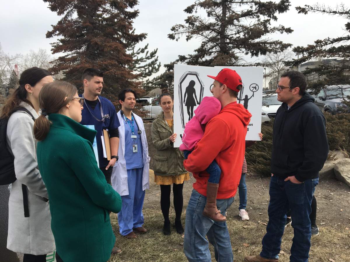 A couple of protesters showed up at the rally to express their concerns over the freedoms of gun owners.