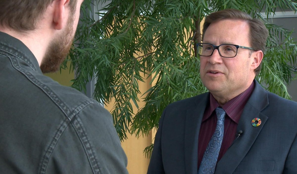Rob Norris, left, has told Global News he is officially running to be the next Mayor of Saskatoon. incumbent Charlie Clark, right, has yet to declare if he is running for reelection.