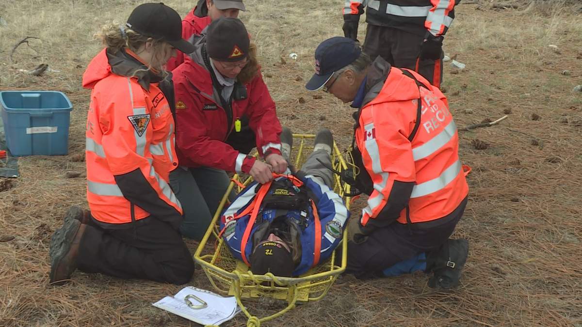 Search and rescue volunteers learn the latest techniques in rope rescue during an annual gathering. 
