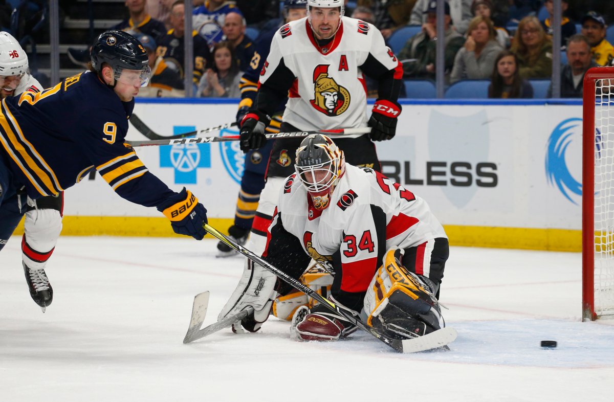 Buffalo Sabres forward Jack Eichel (9) scores past Ottawa Senators goalie Joey Daccord (34) during the third period of an NHL hockey game Thursday, April 4, 2019, in Buffalo, N.Y.