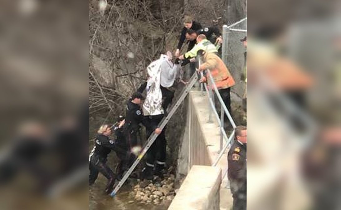 Guelph police say a woman was rescued from the Speed River on Sunday after she fell off Allen's Bridge.