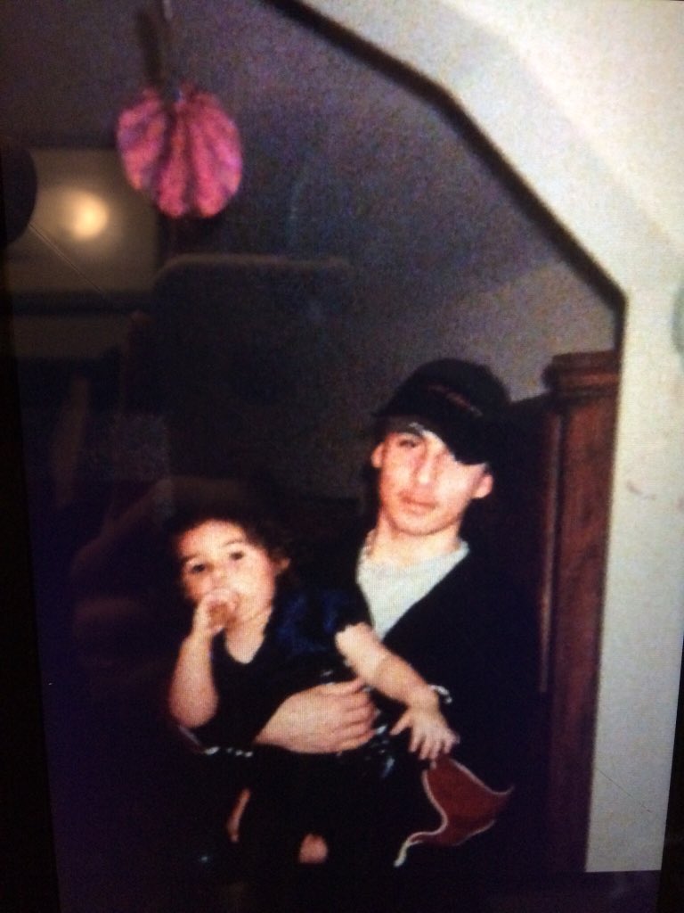 Spencer Lee Hill holding his niece, Destiny Hill.