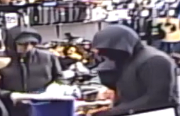 Hamilton police say two suspects robbed Pawn Kings on Main Street East in March.