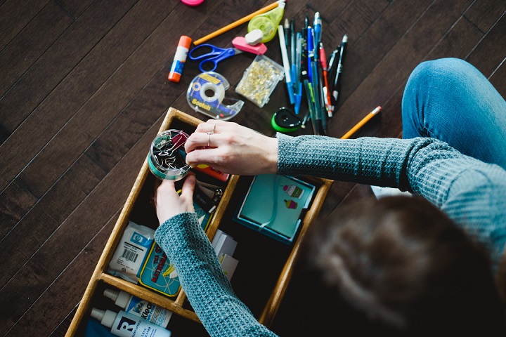 Katie Hudson organizing a drawer.