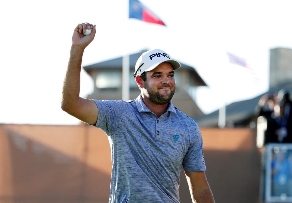 Corey Conners celebrates after sinking a putt on the 18th hole to win the Texas Open golf tournament, Sunday, April 7, 2019, in San Antonio. (AP Photo/Eric Gay).