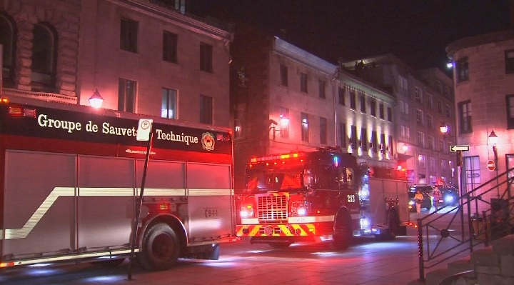 Emergency crews respond to a call after a woman fell from a balcony in Old Montreal. Saturday, April 14, 2019.