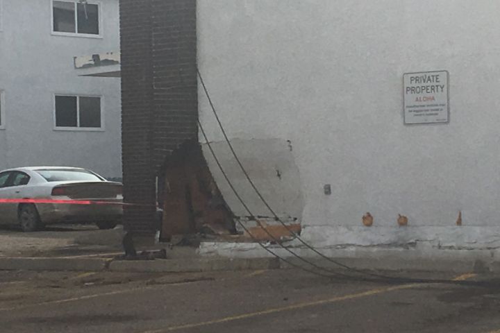 Police said a man has been arrested after a vehicle crashed into a power pole and an apartment building in central Edmonton on Monday afternoon.