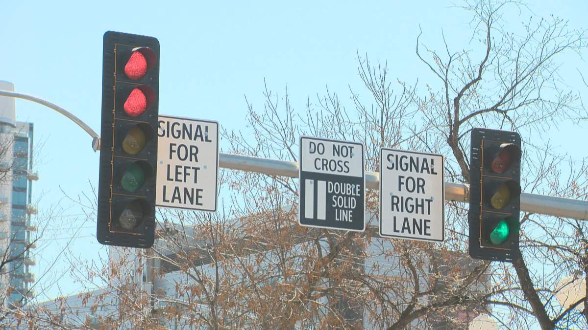 The dual traffic lights installed at 102 Avenue and 125 Street in Edmonton are intended to prevent conflict between cyclists and drivers.