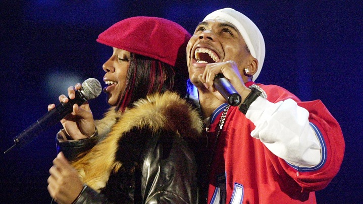 Rap star Nelly, right, rehearses with Kelly Rowland from "Destiny's Child" Feb. 21, 2003 at Madison Square Garden.