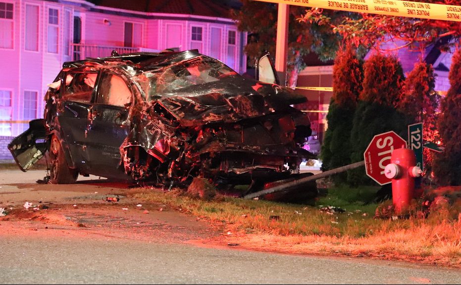 A black Jeep sits heavily damaged after crashing in the intersection of 78 Avenue and 122 Street in Surrey just after midnight Saturday, May 18, 2019.