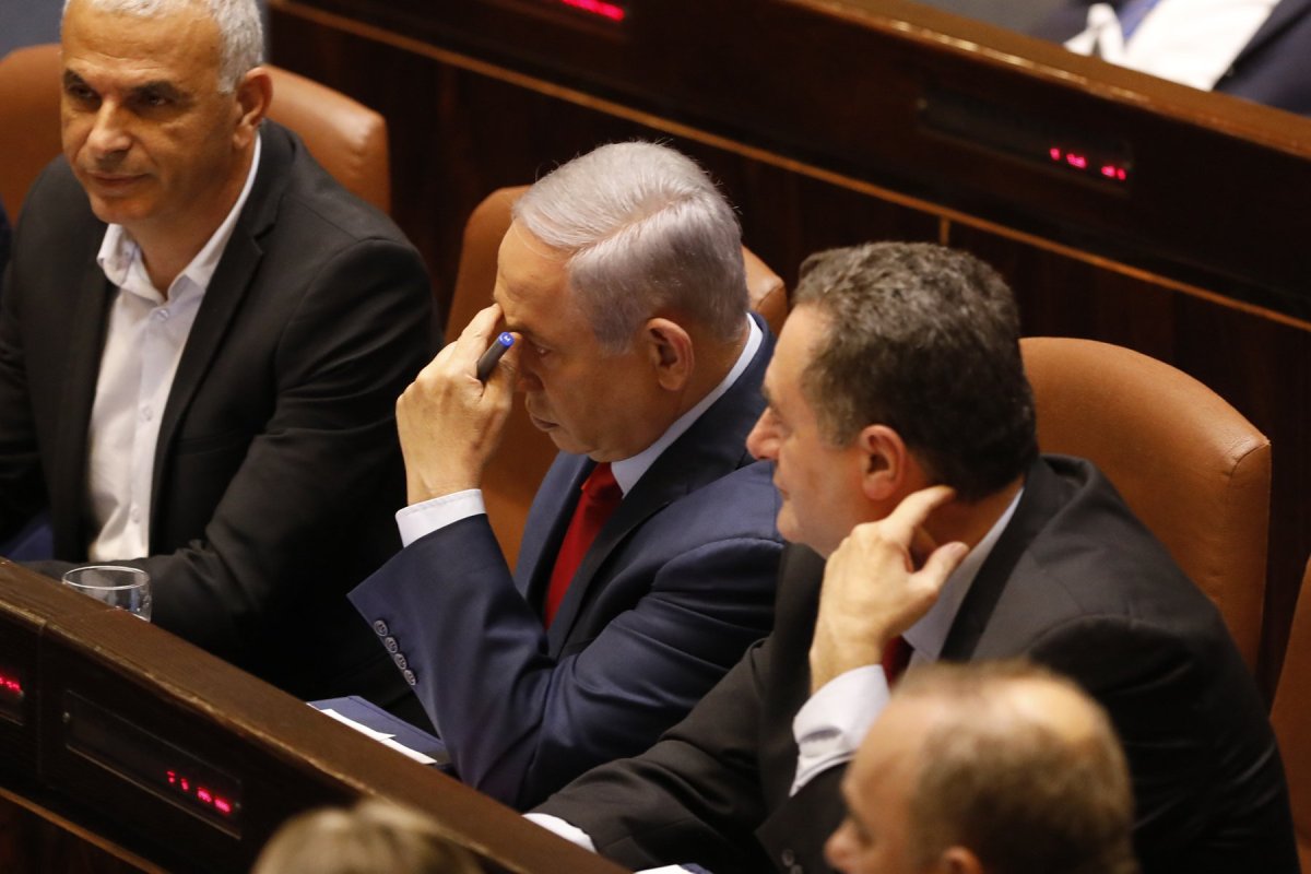 Israeli Prime Minister Benjamin Netanyahu before voting in the Knesset, Israel's parliament in Jerusalem, Wednesday, May 29, 2019. Israel's parliament has voted to dissolve itself, sending the country to an unprecedented second snap election this year as Prime Minister Benjamin Netanyahu failed to form a governing coalition before a midnight deadline. 