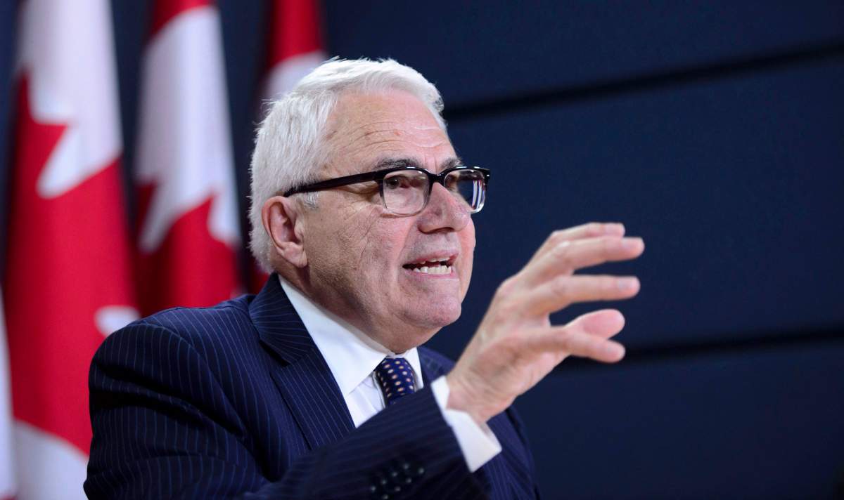 Commissioner of Official Languages, Raymond Theberge, speaks during a press conference at the National Press Theatre in Ottawa on Tuesday, June 12, 2018. 