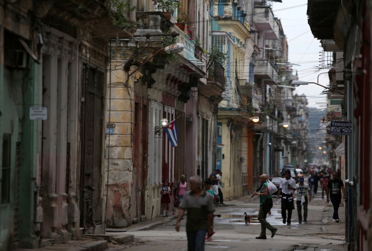 People walk on a street in Havana, Cuba April 10, 2019.  