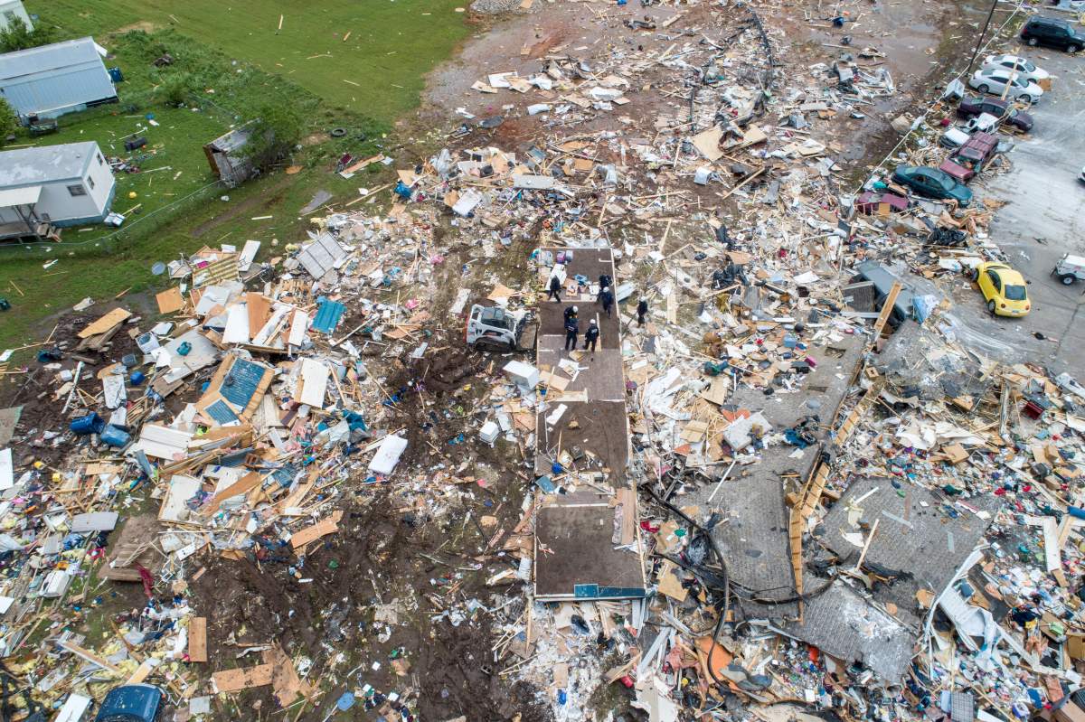 Emergency personnel search an area of destruction after a tornado touched down overnight in an aerial photo in El Reno, Okla., U.S. May 26, 2019.