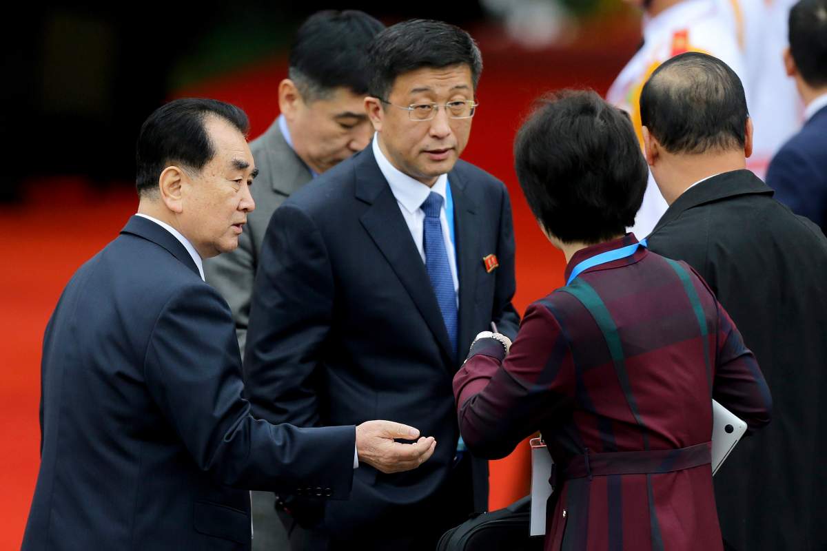 North Korean top representative for U.S. affairs, Kim Hyok Chol, center, is seen at the Dong Dang railway station in Dong Dang, Vietnam, Tuesday, Feb. 26, 2019, ahead of the arrival of North Korean leader Kim Jong Un for his second summit with U.S. President Donald Trump.