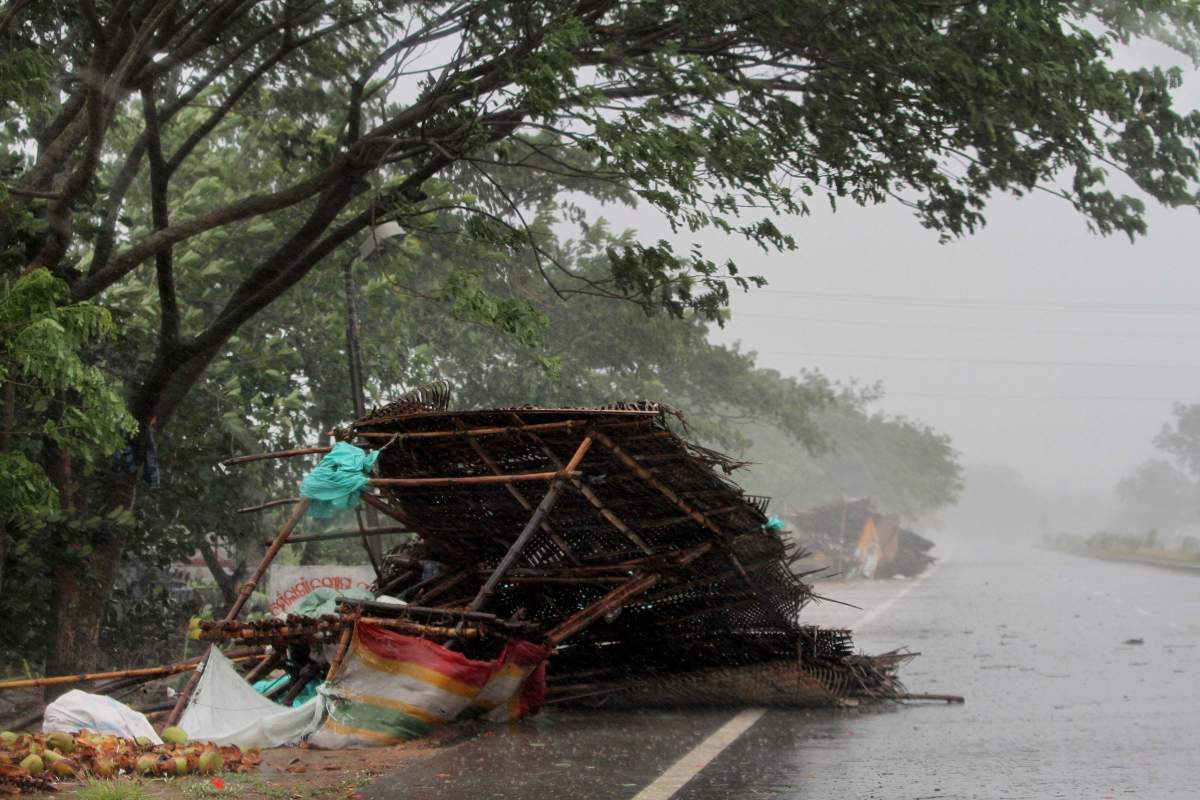 Street shops are seen collapsed due to gusty winds ahead of the landfall of cyclone Fani on the outskirts of Puri, in the Indian state of Odisha, Friday, May 3, 2019.
