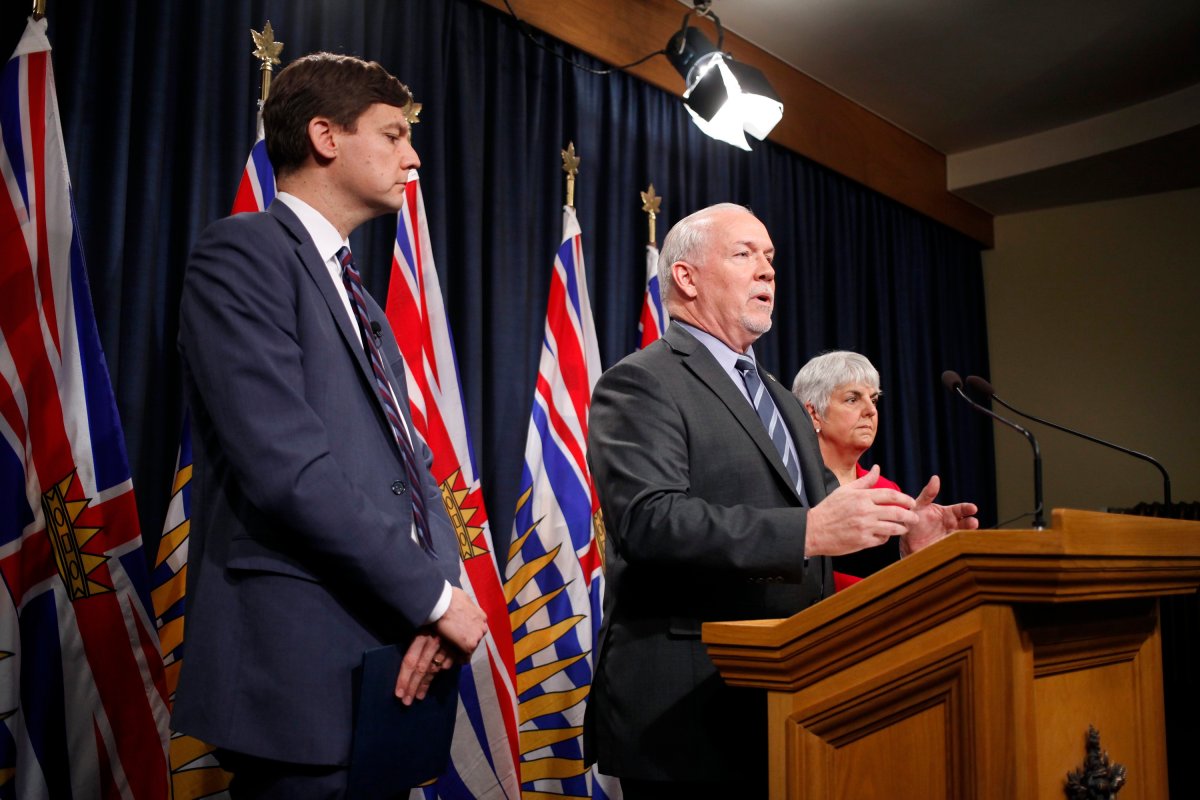B.C. Premier John Horgan is joined by Finance Minister Carole James and Attorney General David Eby as they announce a decision to move forward with the public inquiry in light of recent findings on money laundering in the province during a press conference at the legislature in Victoria, B.C., on Wednesday, May 15, 2019.