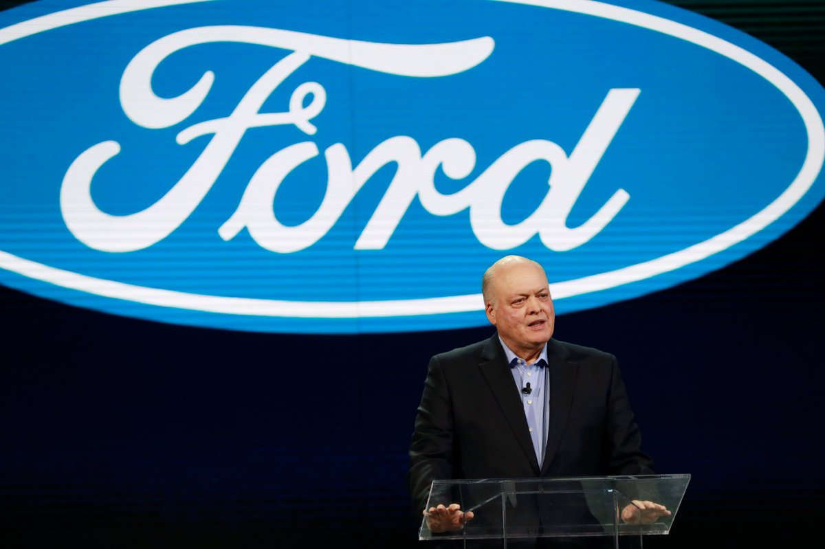 FILE - In this Jan. 14, 2018, file photo Ford President and CEO Jim Hackett prepares to address the media at the North American International Auto Show in Detroit.