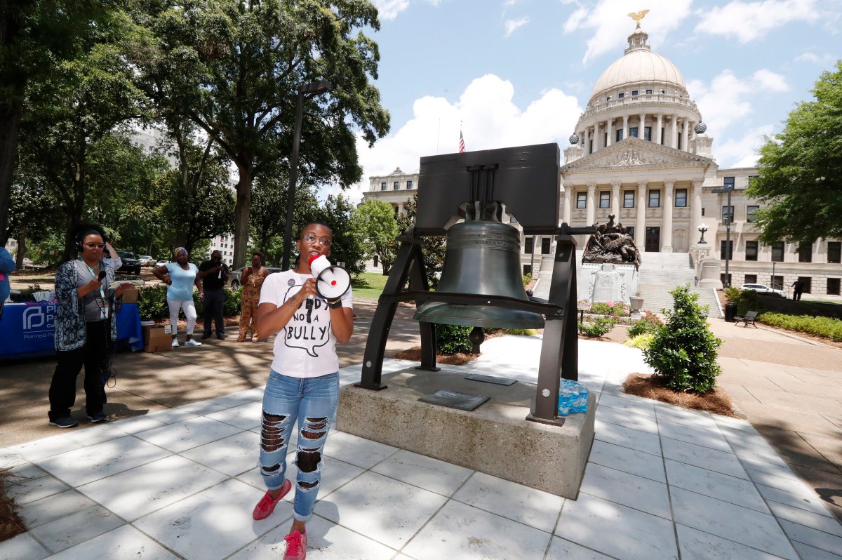 Amanda Furdge of Jackson and a mother of three boys, relates her experience seeking an abortion in the state, as she addresses abortion rights advocates at the Capitol in Jackson, Miss., during a rally to voice their opposition to state legislatures passing abortion bans that prohibit most abortions once a fetal heartbeat can be detected, Tuesday, May 21, 2019.