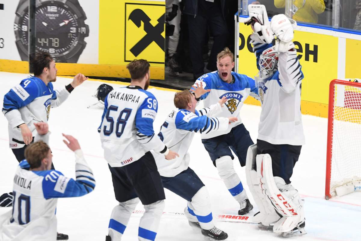 Team Finland and goalkeeper Kevin Lankinen celebrate after beating Canada 3-1 in the 2019 IIHF Ice Hockey World Championships final match between Canada and Finland in Bratislava, Slovakia, on May 26, 2019.