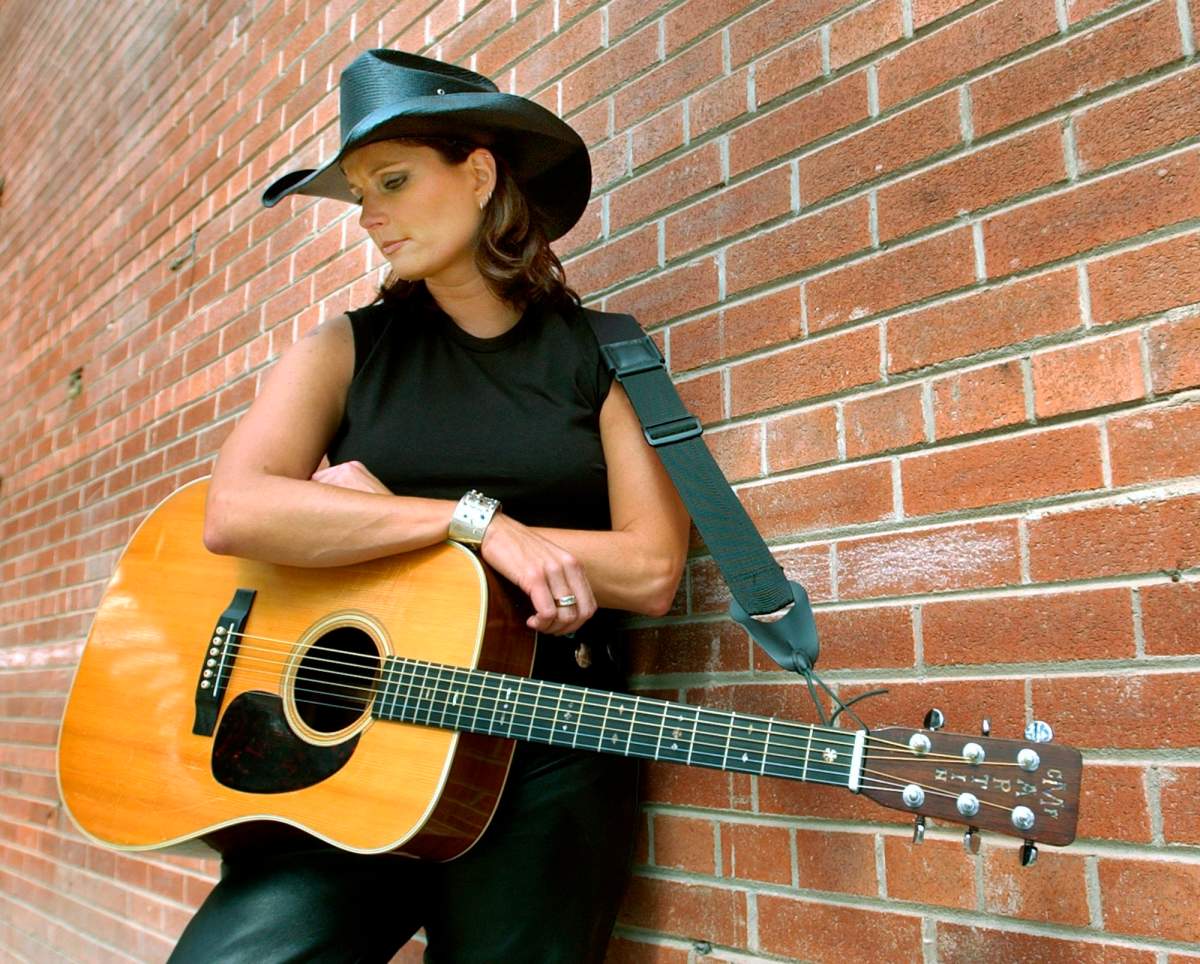 Canadian-born country singer Terri Clark poses for a photo during a break in filming a video at Toronto's Don Brickworks on Saturday, August 30, 2003.